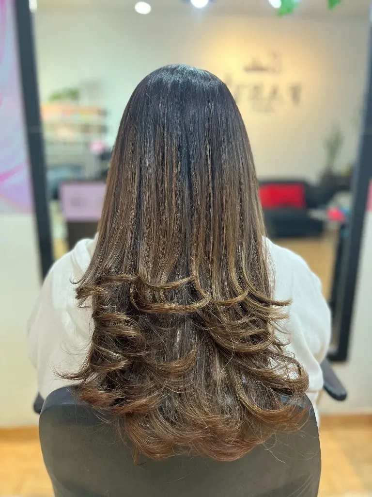 Corte de pelo femenino con movimiento en Pocito San Juan